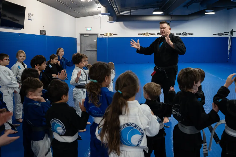 Coach leading a Future Champions Jiu-Jitsu class for kids at Pacific Top Team Penticton